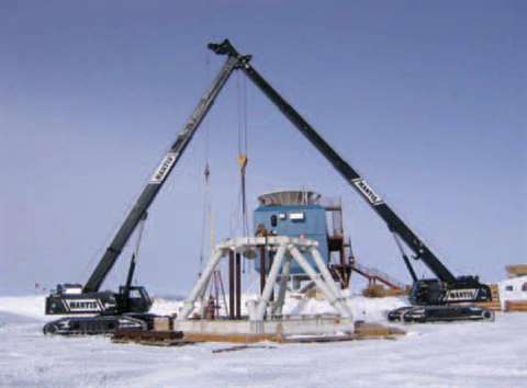 A pair of Mantis duty cycle telescopic crawlers working at the South Pole