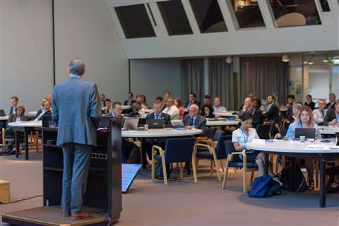 Euroconstruct behind speaker