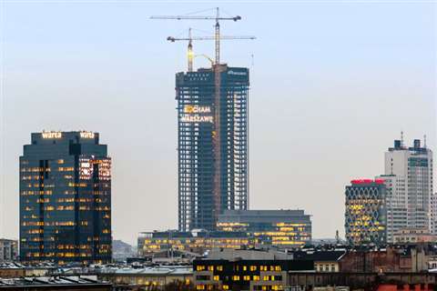 The two Liebherr 280 EC-H tower cranes on the Warsaw Spire
