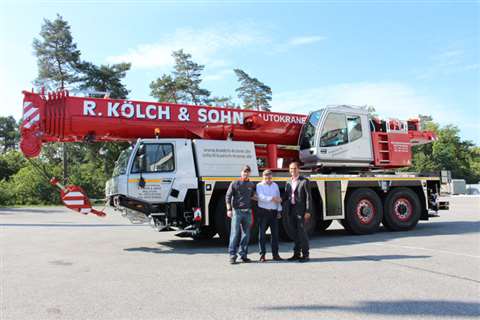 Delivery of the ATF 90G-4 to Richard Kölch &amp; Sohn. From left to right: Andreas Kölch, director o