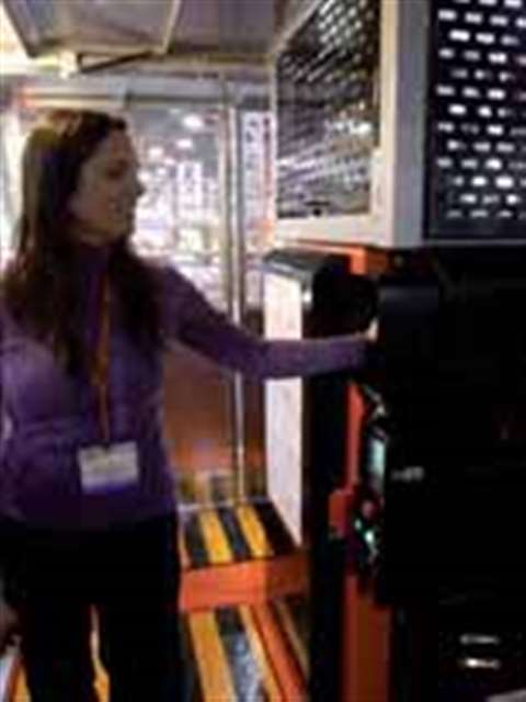 Julie Rainville, project manager with Fraco, works the controls of the company's new Transporter pla