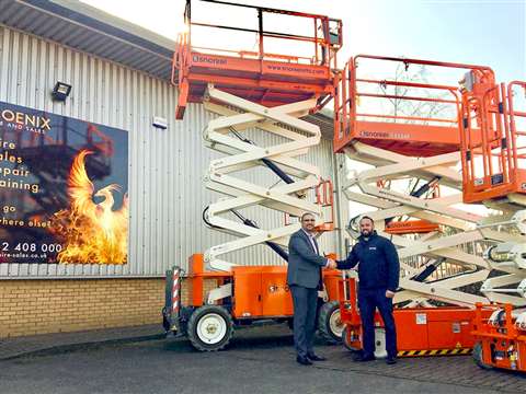 Scott Holtby (right) of Snorkel UK hands over the new lifts to Jason Derraven of Phoenix Hire & Sales