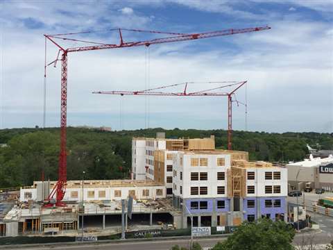 The two Potain Igo T 130s on site at the apartment complex in Quincy, Massachusetts, USA
