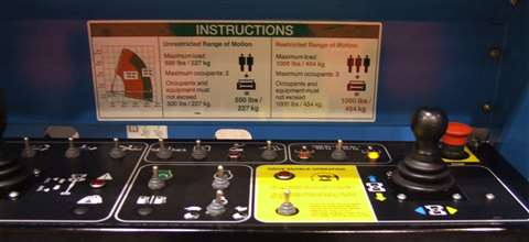 Dual capacity is now available on four Genie boom lifts. The toggle switch to the left of the red em