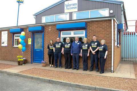 Derek Warren (centre) and the Warren Access team 