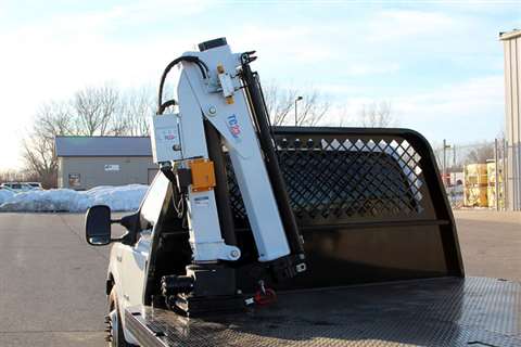 The TC Series has a compact T-Boom crane design and a reach of 5.7 metres
