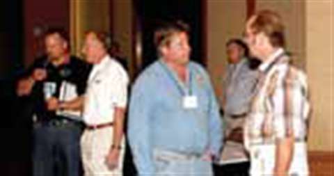 Attendees compare notes between sessions