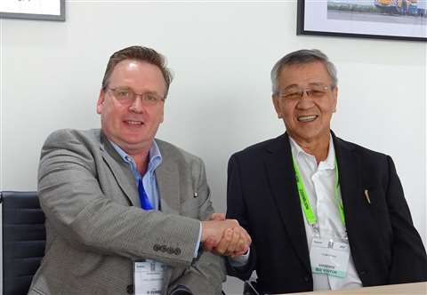 Norbert Dudek from Terex left and KH Ang Tiong Woon Corp