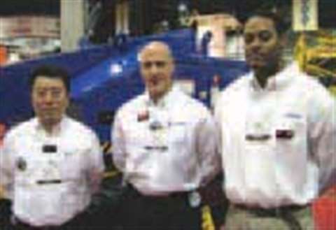 At the Rental Show, from left, are Mac M Fujimoto (Aichi USA president), Alan Dotts (manager) and Ja