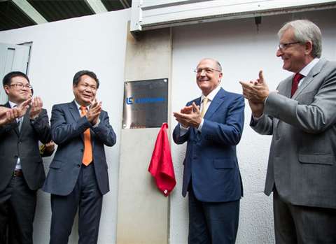 The opening ceremony for Liugong's factory in Mogi Guaçu, Brazil. L-R, Yu Yong, economic advisor at 