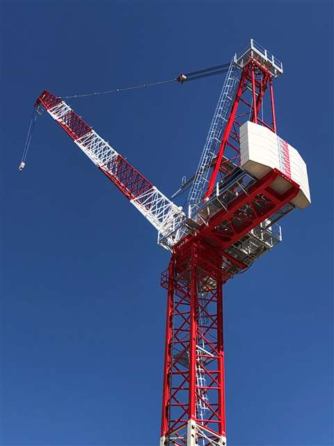Red and white Saez SL 450 R high speed luffing jib tower crane