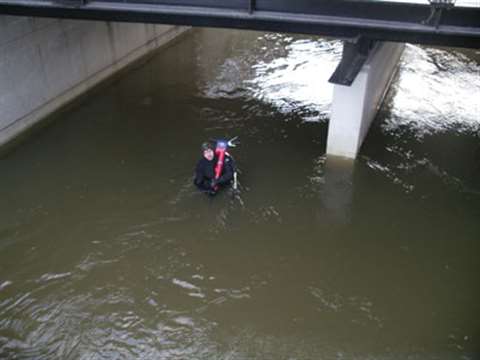 A novel approach to demolition – hand held tools and wet suits allowed the demolition crew to remove
