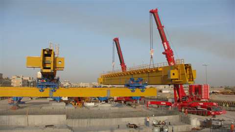 A Terex AC 1000 and an AC 500-2 all terrain crane are used to carry out a tandem lift for a bridge b