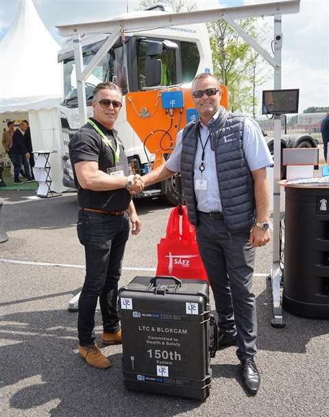 Peter Hird at Blokcam, left, and Martin Harvey, LTC, mark the handover of the 150th camera system