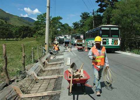 With labour cheap many road expansion and maintenance programs are completed “by hand”.