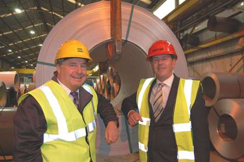 Gary Hunt, managing director of Capital Coated Steel (left) at the new plant with Rob Reid, relation