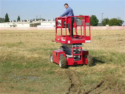MEC's president David White runs the machine through soft ground, mud and standing water.