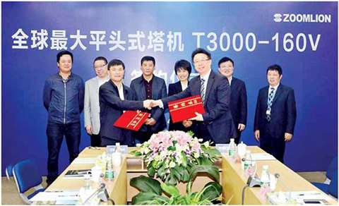 General manager of Zoomlion’s Construction Hoisting Division, Huang Qun, and deputy general managers