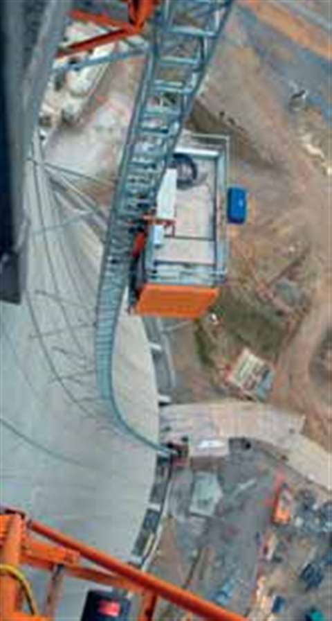 This great shot shows a specially modified 2000 kg Scanclimber SC2032F hoist being used on the const