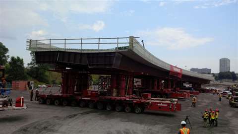 The curved bridge was installed using 96-axle self-propelled modular transporter (SPMT) trailer, bui
