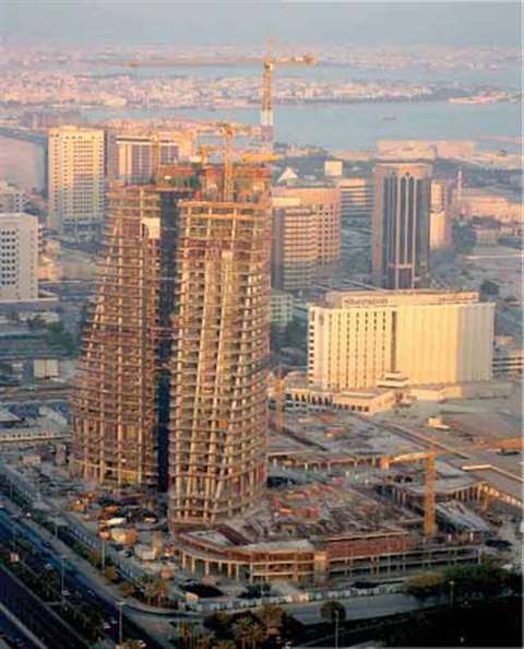 Five Potain tower cranes, belonging to local rental house NFT, at work on the Bahrain City Gardens p