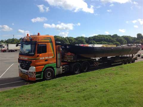 Transport company Van der Vlist helps transport a barge from Zaandam in North Holland to Exmouth, UK