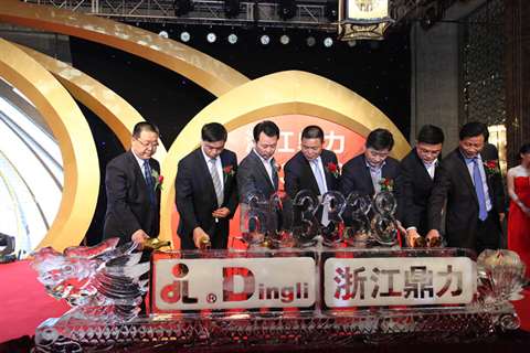 Dingli representatives carry out the stock code start ceremony in which red wine is poured into the 