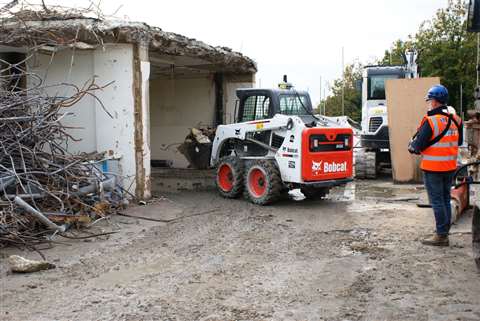 Erith Contractor's Bobcat S450 Remote Control compact loader onsite in London, UK