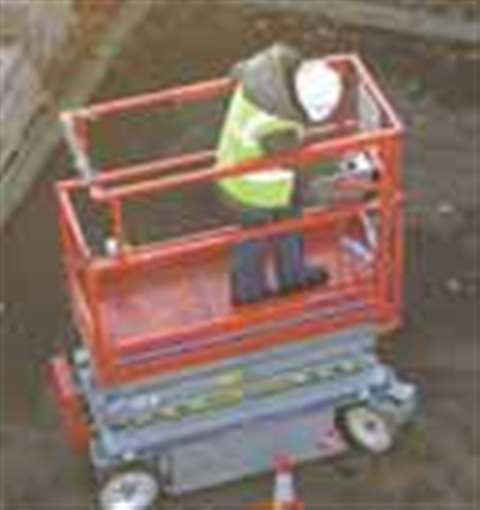 Intermat managing director Valérie Queffelec operates a scissor lift during her IPAF training.