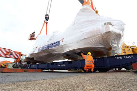 The excavator components were loaded onto the M/V Tortugas to be sailed to South Africa
