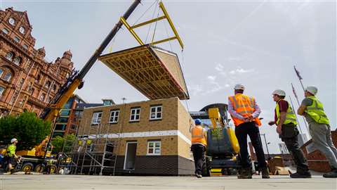 Ilke Homes using an Ainscough crane to assemble a modular prefabricated house