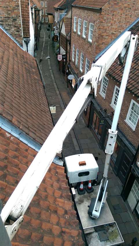 a Wilson Access Hire truck mount in the Shambles, York, UK. 