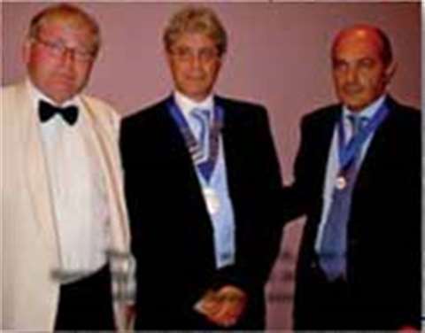 The EDA's new president, Yves Canessa, flanked by outgoing president Jan Brandis (left) and Giuseppe