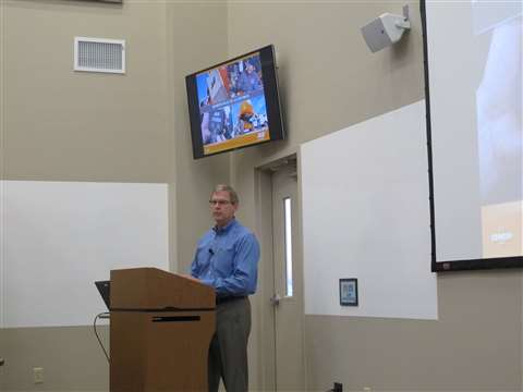Frank Nerenhausen, president of JLG Industries, Inc., addresses the audience at the company's new tr