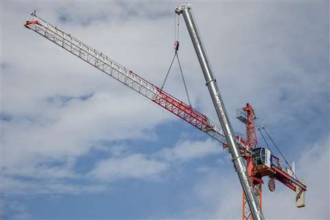 A Grove GMK5250L all terrain erecting a Potain MD238AJ10 tower crane in Nany, France
