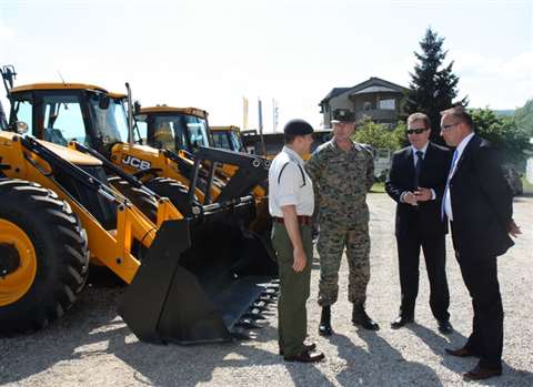 Lt Col Rob Tomlinson of the British Embassy; General Sakib Foric of the Bosnian Army; Sinisa Tomasic