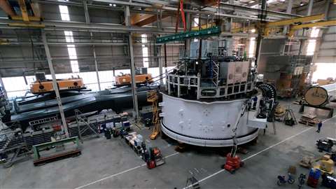 The upper and lower sections of the 3,000 tonne crane are now married, pictured already assembled inside the Rostock factory