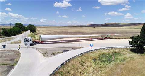 WingMax, part of the TeleMax series of flat bed semi-trailers from Faymonville, loaded with a blade on the road