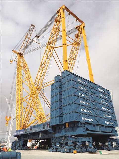 Sarens SGC-250 can carry up to 52 counterweight containers, each one weighing 100 tonnes and filled using locally sourced material