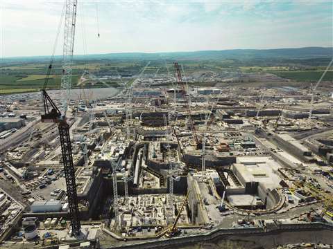 The view south across the Hinkley Point C Construction Site showing the main excavations and pipework for the cooling water systems of unit 1.