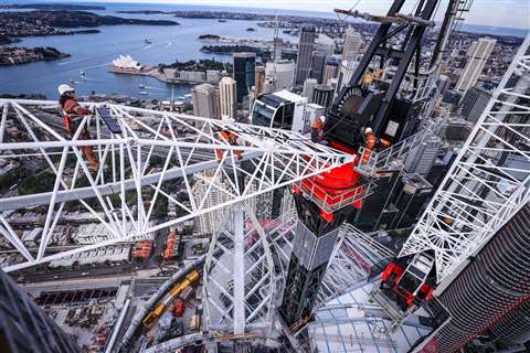 Marr preparing to remove the lattice boom of the red and white M390D at the top of the new Crown Sydney building. Photo: Getty