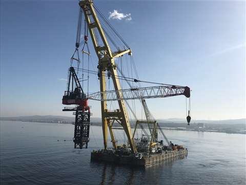 The fully assembled cranes were moved into position using the Taklift 4 floating heavy lift barge crane, which has a lift capacity of 2,200 tonnes.