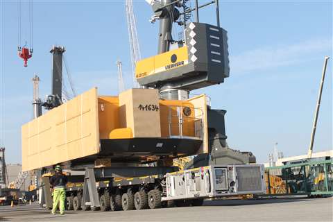 The main upperworks of a Liebherr mobile harbour crane travelling on Cometto MSPE