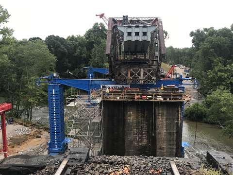 End view of the new single track span positioned inside the old twin track bridge